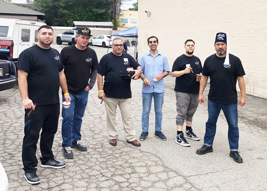 Sciots in parking lot smoking cigars