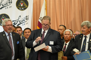 humbled recipient speaks at mic