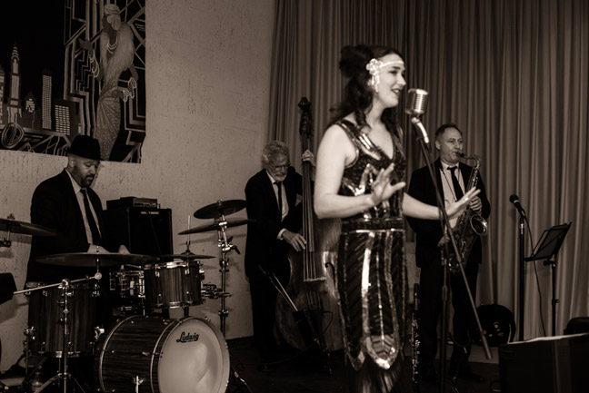 5 peice band on stage playing 1920's music