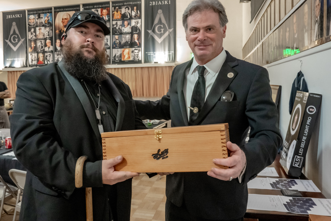 winner of custom cigar box at silent auction