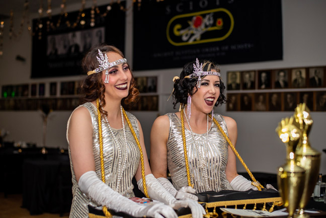 Cigar girls walking around with their vendor trays