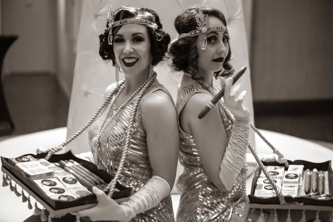2 cute cigar girls selling their wares