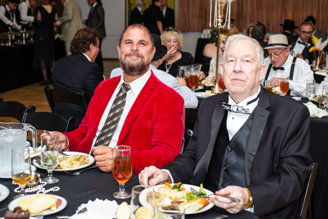 Dan Dugo and Robert Edis sitting at a table