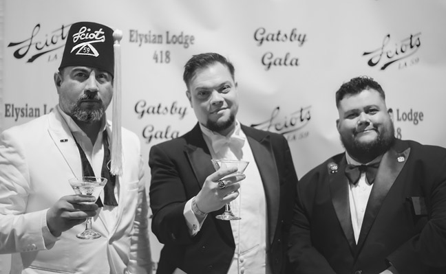 Guillermo, Ron and Gallen at the step and repeat